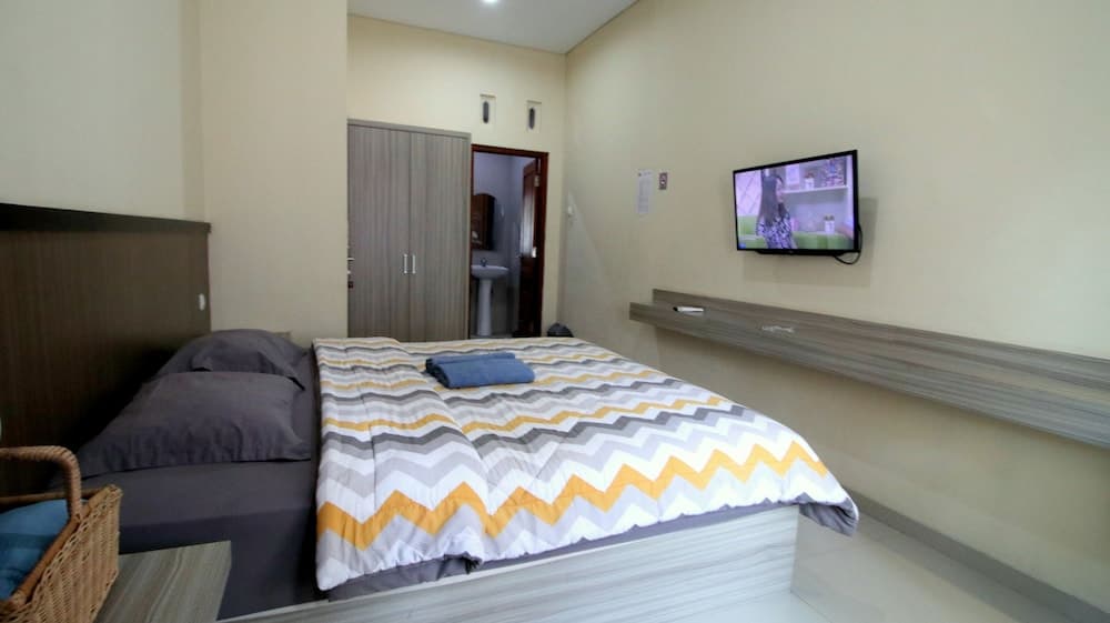 D'Java Homestay Babarsari By The Grand Java, Room, photo 4