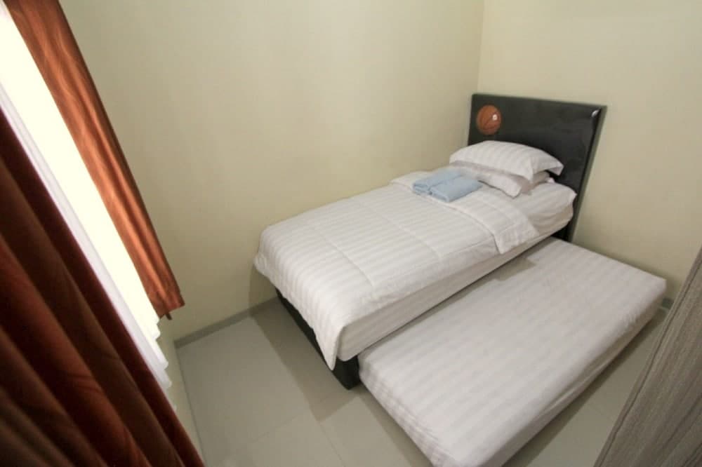 D'Java Homestay Babarsari By The Grand Java, Room, photo 3