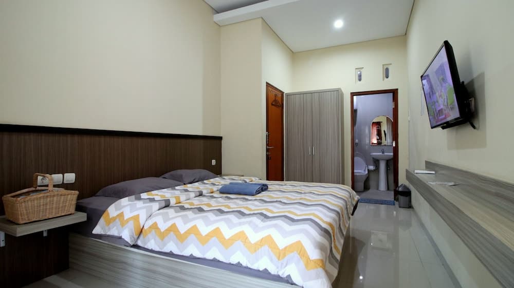 D'Java Homestay Babarsari By The Grand Java, Room, photo 5