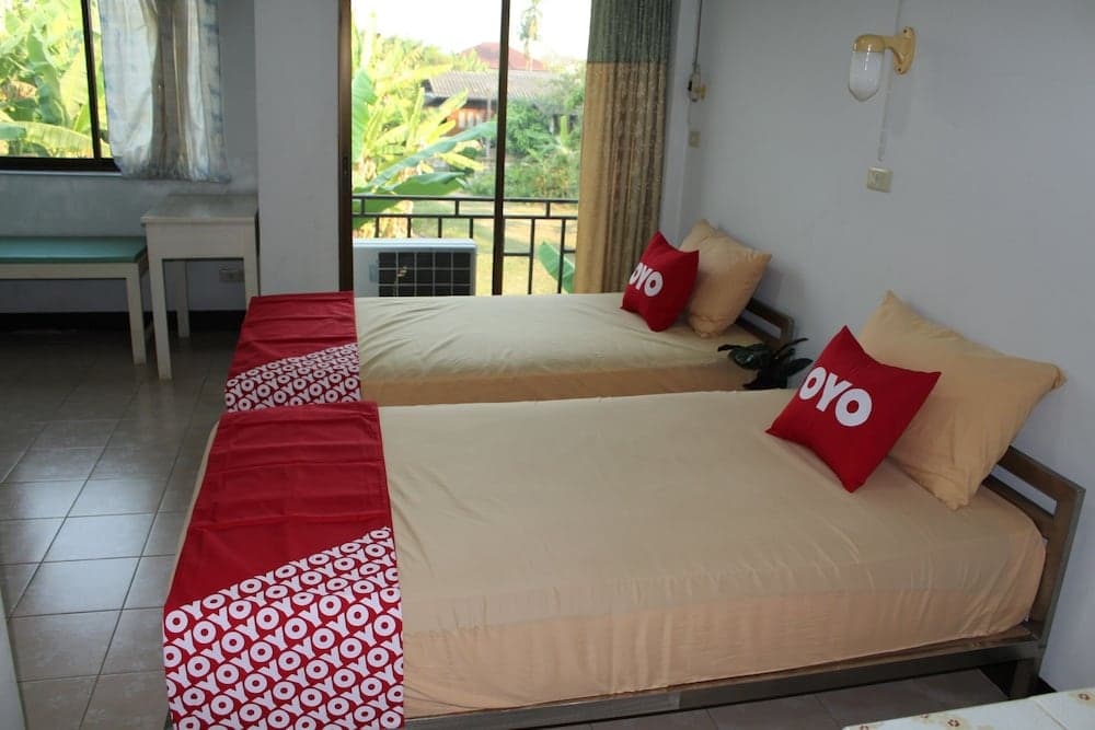 OYO 75420 Howto Hotel 객실 사진 4